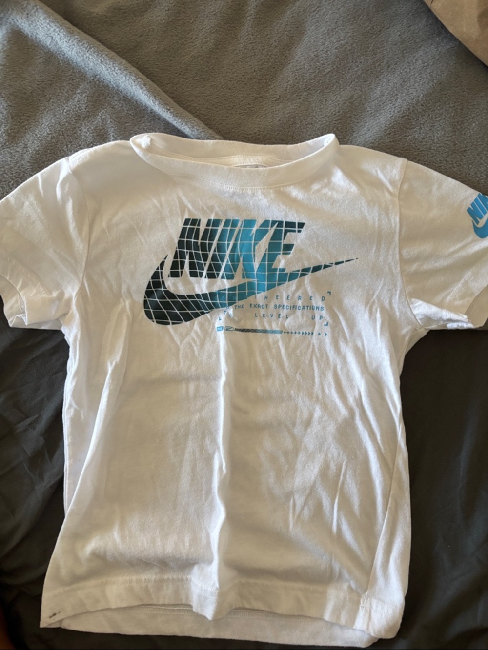 Nike White Kids Tee with Teal and Navy Graphic Logo